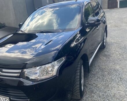 Черный Мицубиси Аутлендер, объемом двигателя 2 л и пробегом 168 тыс. км за 12007 $, фото 2 на Automoto.ua