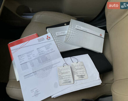 Черный Мицубиси Аутлендер, объемом двигателя 2.27 л и пробегом 241 тыс. км за 14400 $, фото 76 на Automoto.ua