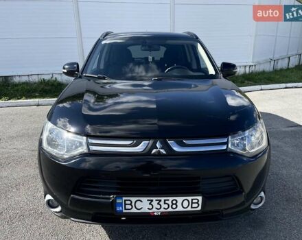 Черный Мицубиси Аутлендер, объемом двигателя 2 л и пробегом 270 тыс. км за 11400 $, фото 3 на Automoto.ua