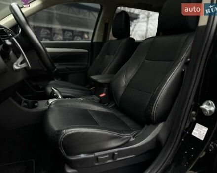 Чорний Міцубісі Аутлендер, об'ємом двигуна 2 л та пробігом 213 тис. км за 13888 $, фото 13 на Automoto.ua