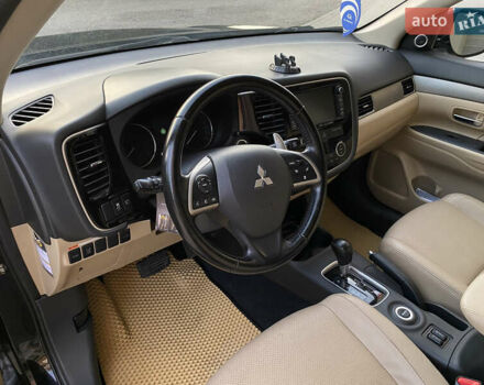 Черный Мицубиси Аутлендер, объемом двигателя 2.27 л и пробегом 241 тыс. км за 14400 $, фото 57 на Automoto.ua