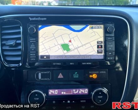 Черный Мицубиси Аутлендер, объемом двигателя 2.3 л и пробегом 219 тыс. км за 13600 $, фото 7 на Automoto.ua