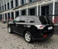 Чорний Міцубісі Аутлендер, об'ємом двигуна 2.4 л та пробігом 150 тис. км за 14100 $, фото 2 на Automoto.ua
