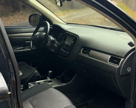 Міцубісі Аутлендер 2013 у Броварах на Automoto.ua Чорний Міцубісі Аутлендер, об'ємом двигуна 2.36 л та пробігом 168 тис. км за 11700 $, фото 15 на Automoto.ua