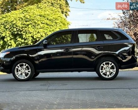 Чорний Міцубісі Аутлендер, об'ємом двигуна 2.36 л та пробігом 220 тис. км за 11000 $, фото 1 на Automoto.ua