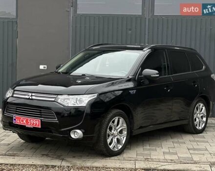 Чорний Міцубісі Аутлендер, об'ємом двигуна 2 л та пробігом 213 тис. км за 13888 $, фото 1 на Automoto.ua