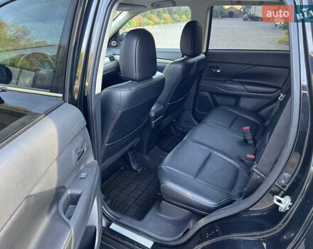 Черный Мицубиси Аутлендер, объемом двигателя 2 л и пробегом 190 тыс. км за 12500 $, фото 21 на Automoto.ua