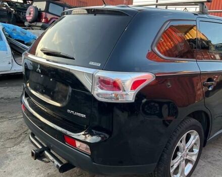 Черный Мицубиси Аутлендер, объемом двигателя 2.36 л и пробегом 226 тыс. км за 12499 $, фото 13 на Automoto.ua