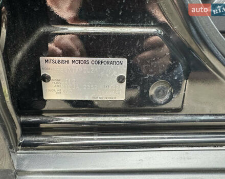 Черный Мицубиси Аутлендер, объемом двигателя 2.4 л и пробегом 150 тыс. км за 13700 $, фото 4 на Automoto.ua