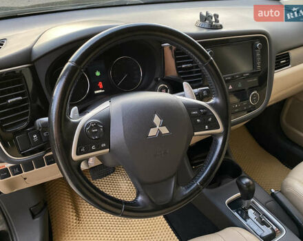 Черный Мицубиси Аутлендер, объемом двигателя 2.27 л и пробегом 241 тыс. км за 14400 $, фото 58 на Automoto.ua