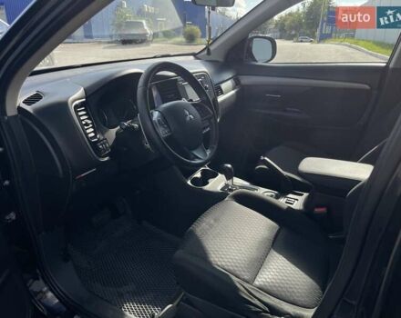 Черный Мицубиси Аутлендер, объемом двигателя 2 л и пробегом 270 тыс. км за 11400 $, фото 13 на Automoto.ua