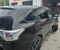 Черный Мицубиси Аутлендер, объемом двигателя 2 л и пробегом 140 тыс. км за 11300 $, фото 2 на Automoto.ua