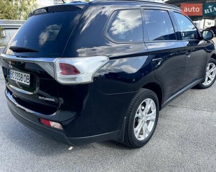 Черный Мицубиси Аутлендер, объемом двигателя 2 л и пробегом 270 тыс. км за 11400 $, фото 6 на Automoto.ua