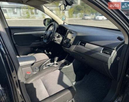 Черный Мицубиси Аутлендер, объемом двигателя 2 л и пробегом 270 тыс. км за 11400 $, фото 14 на Automoto.ua