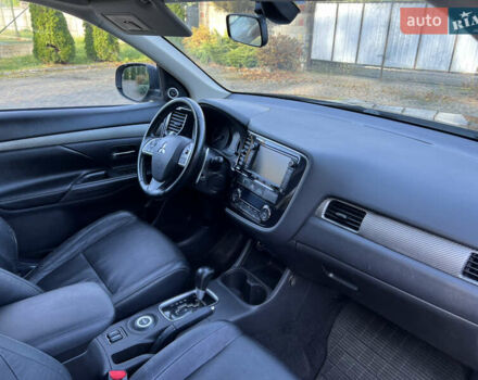 Черный Мицубиси Аутлендер, объемом двигателя 2 л и пробегом 190 тыс. км за 12500 $, фото 28 на Automoto.ua