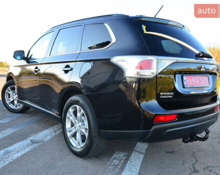 Чорний Міцубісі Аутлендер, об'ємом двигуна 2.2 л та пробігом 237 тис. км за 12550 $, фото 26 на Automoto.ua