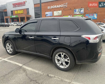 Черный Мицубиси Аутлендер, объемом двигателя 2.4 л и пробегом 150 тыс. км за 13700 $, фото 16 на Automoto.ua