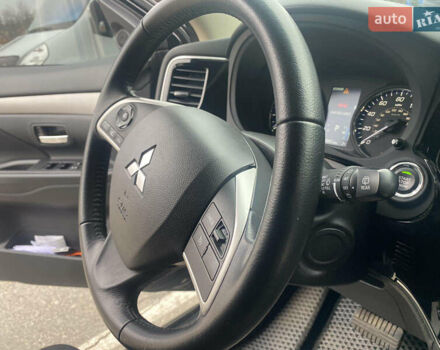 Черный Мицубиси Аутлендер, объемом двигателя 2.4 л и пробегом 150 тыс. км за 13700 $, фото 6 на Automoto.ua