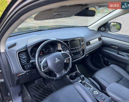 Черный Мицубиси Аутлендер, объемом двигателя 2 л и пробегом 190 тыс. км за 12500 $, фото 19 на Automoto.ua