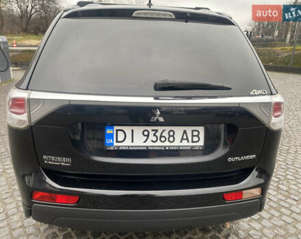 Черный Мицубиси Аутлендер, объемом двигателя 2.27 л и пробегом 280 тыс. км за 11808 $, фото 4 на Automoto.ua