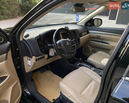 Черный Мицубиси Аутлендер, объемом двигателя 2.27 л и пробегом 241 тыс. км за 14400 $, фото 51 на Automoto.ua