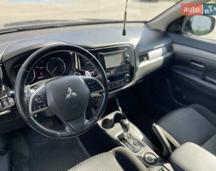 Черный Мицубиси Аутлендер, объемом двигателя 2 л и пробегом 270 тыс. км за 11400 $, фото 15 на Automoto.ua