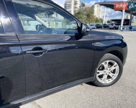 Черный Мицубиси Аутлендер, объемом двигателя 2 л и пробегом 270 тыс. км за 11400 $, фото 5 на Automoto.ua