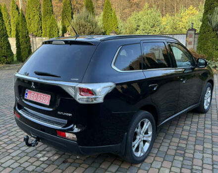 Черный Мицубиси Аутлендер, объемом двигателя 2 л и пробегом 190 тыс. км за 12500 $, фото 11 на Automoto.ua