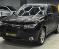 Черный Мицубиси Аутлендер, объемом двигателя 2.4 л и пробегом 150 тыс. км за 14200 $, фото 2 на Automoto.ua