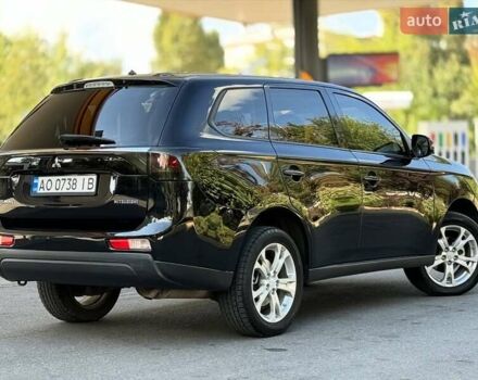 Чорний Міцубісі Аутлендер, об'ємом двигуна 2.36 л та пробігом 220 тис. км за 11000 $, фото 4 на Automoto.ua