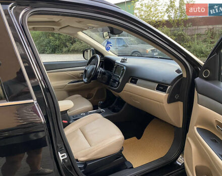 Черный Мицубиси Аутлендер, объемом двигателя 2.27 л и пробегом 241 тыс. км за 14400 $, фото 26 на Automoto.ua