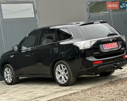 Чорний Міцубісі Аутлендер, об'ємом двигуна 2 л та пробігом 213 тис. км за 13888 $, фото 10 на Automoto.ua
