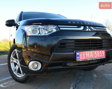 Чорний Міцубісі Аутлендер, об'ємом двигуна 2.2 л та пробігом 237 тис. км за 12550 $, фото 18 на Automoto.ua
