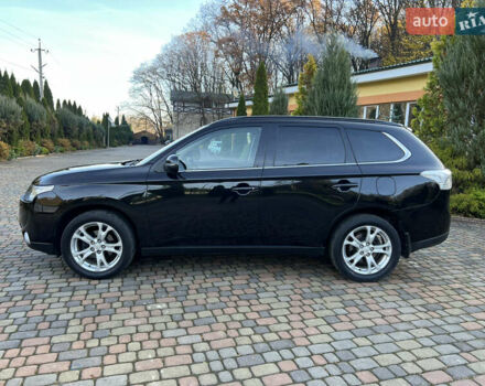 Черный Мицубиси Аутлендер, объемом двигателя 2 л и пробегом 190 тыс. км за 12500 $, фото 12 на Automoto.ua