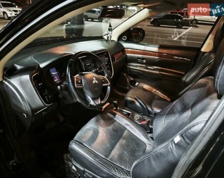 Черный Мицубиси Аутлендер, объемом двигателя 2.36 л и пробегом 226 тыс. км за 12499 $, фото 28 на Automoto.ua