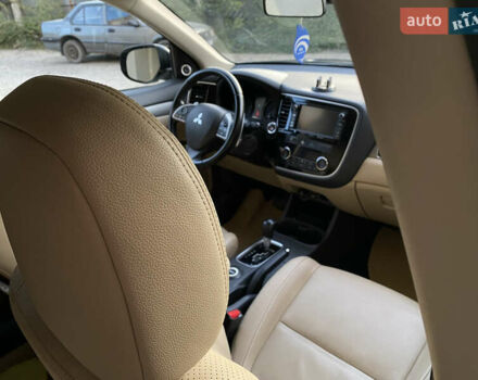 Черный Мицубиси Аутлендер, объемом двигателя 2.27 л и пробегом 241 тыс. км за 14400 $, фото 35 на Automoto.ua