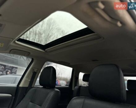 Чорний Міцубісі Аутлендер, об'ємом двигуна 2 л та пробігом 213 тис. км за 13888 $, фото 17 на Automoto.ua