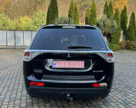 Черный Мицубиси Аутлендер, объемом двигателя 2 л и пробегом 190 тыс. км за 12500 $, фото 4 на Automoto.ua