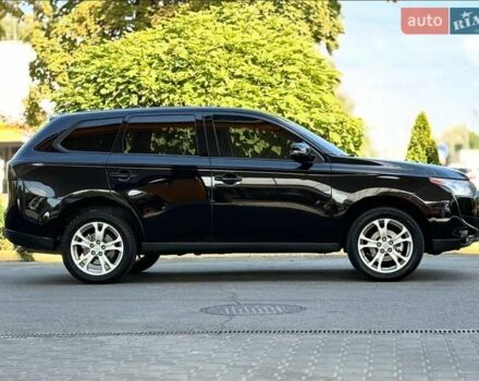 Чорний Міцубісі Аутлендер, об'ємом двигуна 2.36 л та пробігом 220 тис. км за 11000 $, фото 5 на Automoto.ua