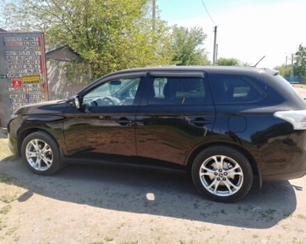 Черный Мицубиси Аутлендер, объемом двигателя 2.4 л и пробегом 300 тыс. км за 11000 $, фото 4 на Automoto.ua