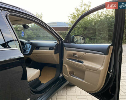 Черный Мицубиси Аутлендер, объемом двигателя 2.27 л и пробегом 241 тыс. км за 14400 $, фото 25 на Automoto.ua