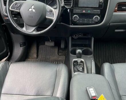 Черный Мицубиси Аутлендер, объемом двигателя 2.36 л и пробегом 226 тыс. км за 12499 $, фото 3 на Automoto.ua