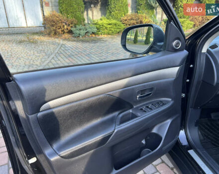 Черный Мицубиси Аутлендер, объемом двигателя 2 л и пробегом 190 тыс. км за 12500 $, фото 16 на Automoto.ua