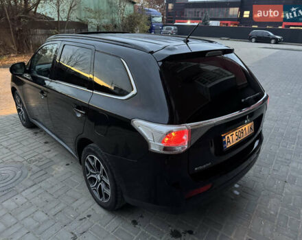 Черный Мицубиси Аутлендер, объемом двигателя 2.27 л и пробегом 241 тыс. км за 14400 $, фото 17 на Automoto.ua