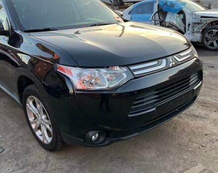 Черный Мицубиси Аутлендер, объемом двигателя 2.36 л и пробегом 226 тыс. км за 12499 $, фото 4 на Automoto.ua