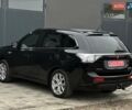 Чорний Міцубісі Аутлендер, об'ємом двигуна 2 л та пробігом 213 тис. км за 13888 $, фото 11 на Automoto.ua