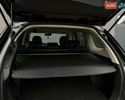 Чорний Міцубісі Аутлендер, об'ємом двигуна 2 л та пробігом 213 тис. км за 13888 $, фото 30 на Automoto.ua