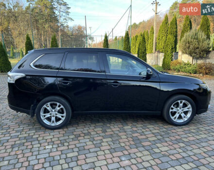 Черный Мицубиси Аутлендер, объемом двигателя 2 л и пробегом 190 тыс. км за 12500 $, фото 6 на Automoto.ua