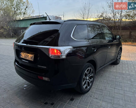 Черный Мицубиси Аутлендер, объемом двигателя 2.27 л и пробегом 241 тыс. км за 14400 $, фото 12 на Automoto.ua