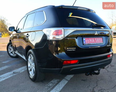 Чорний Міцубісі Аутлендер, об'ємом двигуна 2.2 л та пробігом 237 тис. км за 12550 $, фото 25 на Automoto.ua